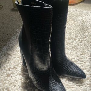 Black high heel snake skin booties